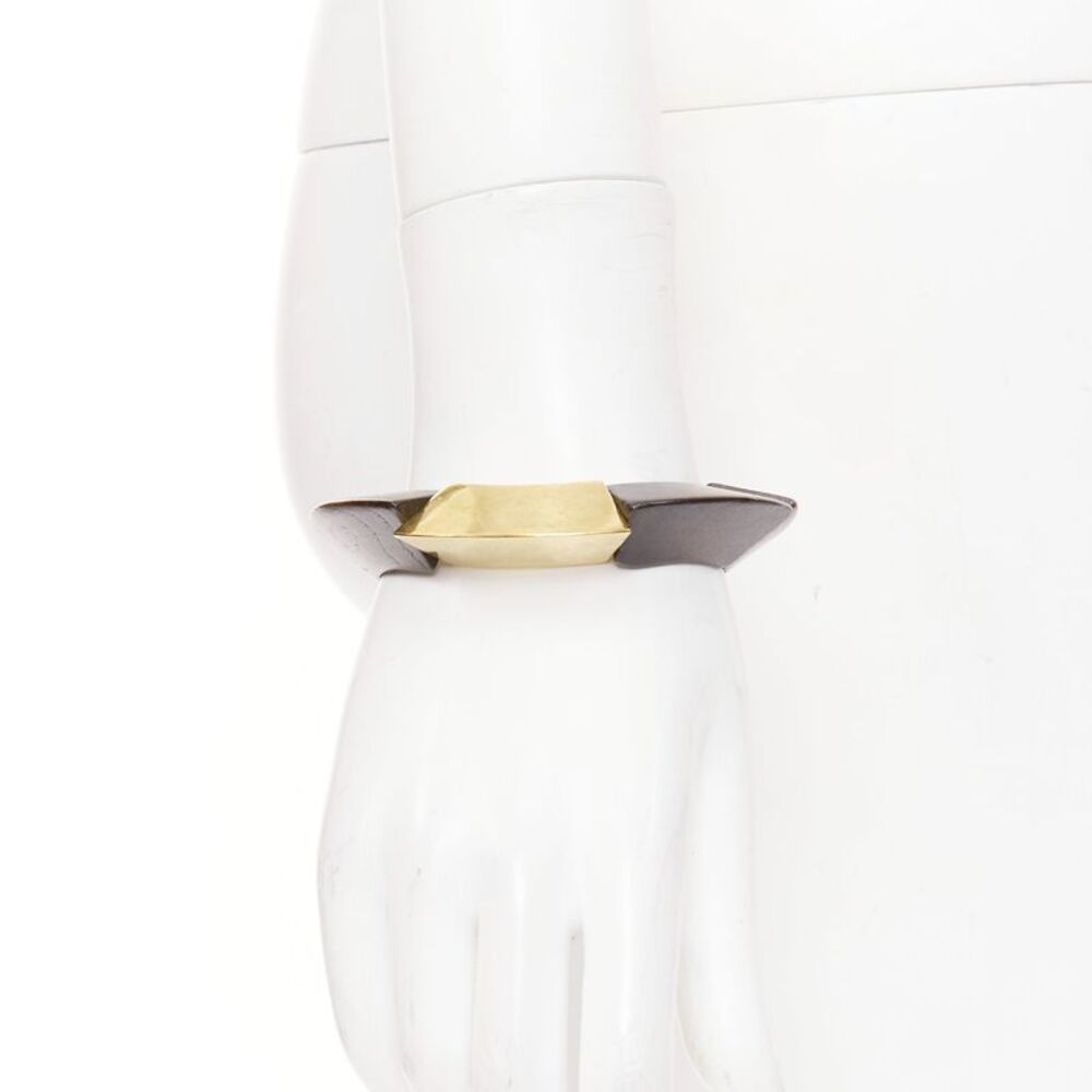 Saint Laurent gold tone brass wood elastic bracelet cuff